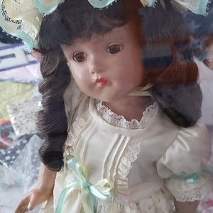 Porcelain doll in wooden case